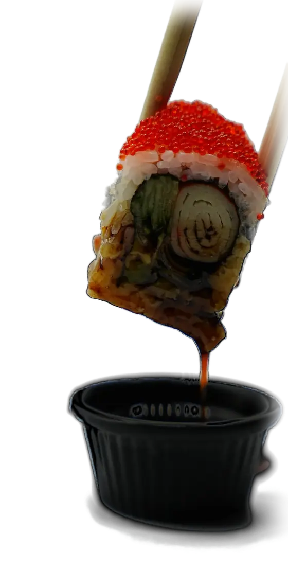 California roll trempé dans la sauce soja